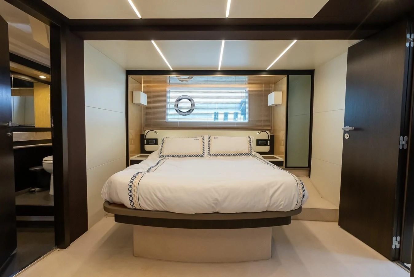 a bed in a room aboard PRIVE Yacht for Sale