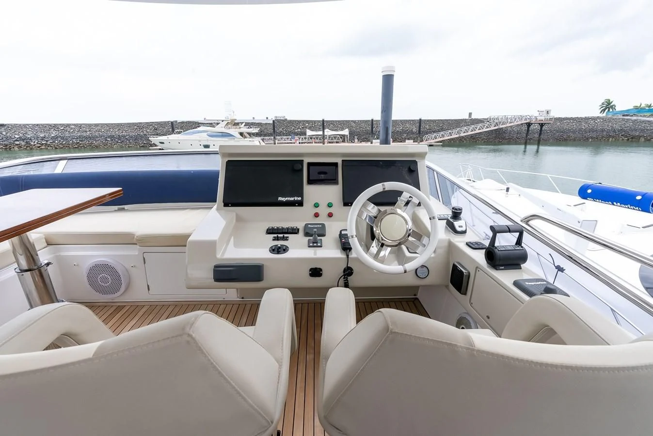 a boat with a steering wheel aboard PRIVE Yacht for Sale