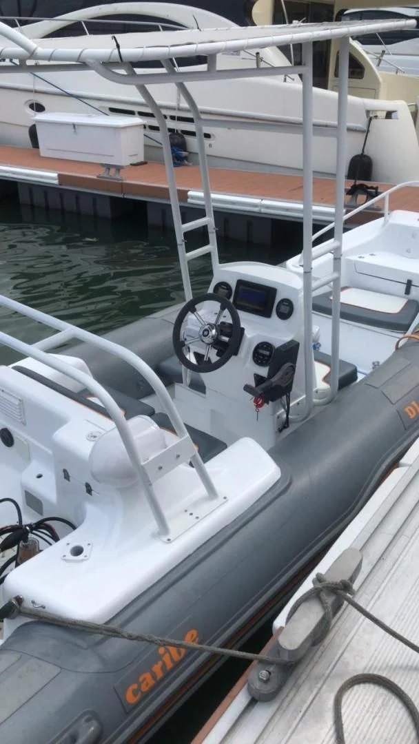 a boat with a steering wheel aboard PRIVE Yacht for Sale