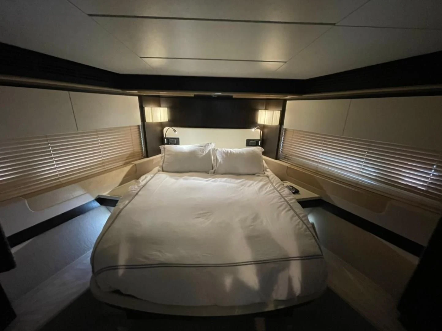 a room with two beds aboard PRIVE Yacht for Sale