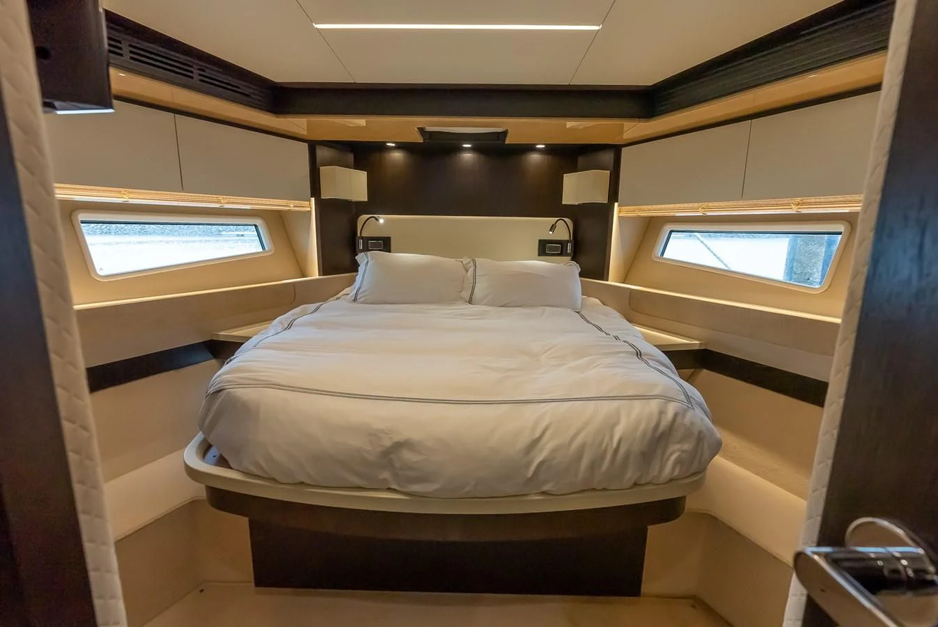 a room with bunk beds aboard PRIVE Yacht for Sale