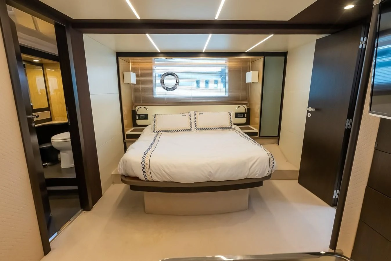 a bed in a room aboard PRIVE Yacht for Sale