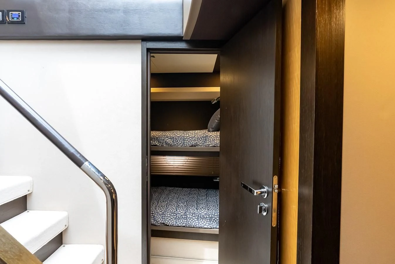 a bathroom with a toilet and a sink aboard PRIVE Yacht for Sale