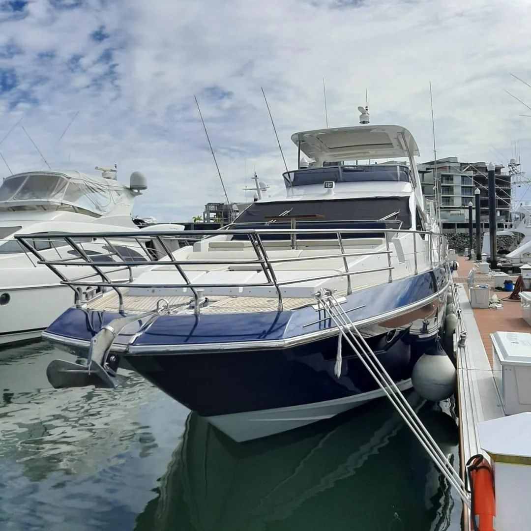 a boat docked at a pier aboard PRIVE Yacht for Sale