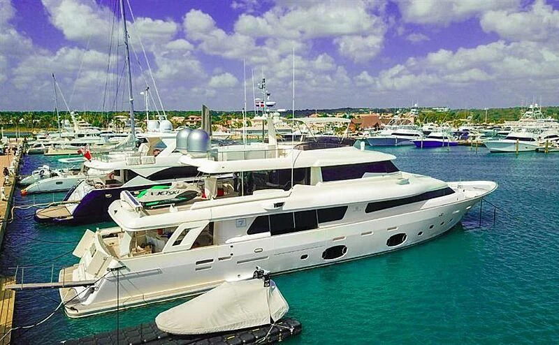 a boat docked at a pier aboard SE7EN Yacht for Sale
