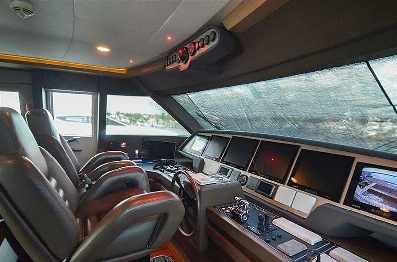 inside of a vehicle with many monitors and screens aboard SE7EN Yacht for Sale