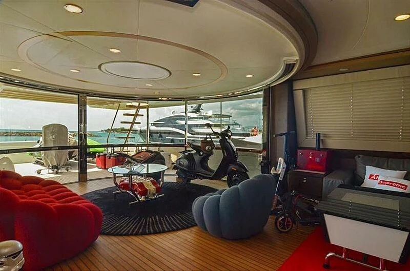 a room with a large window and a view of the city aboard SE7EN Yacht for Sale