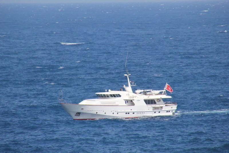 a white boat in the water aboard VESPUCCI Yacht for Sale