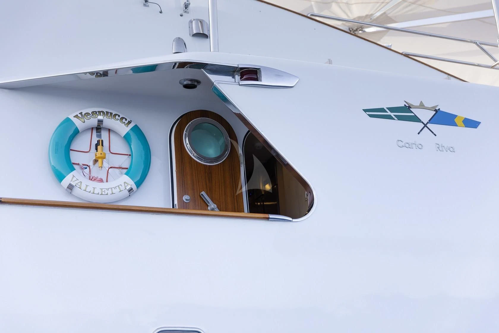 a clock on a white surface aboard VESPUCCI Yacht for Sale