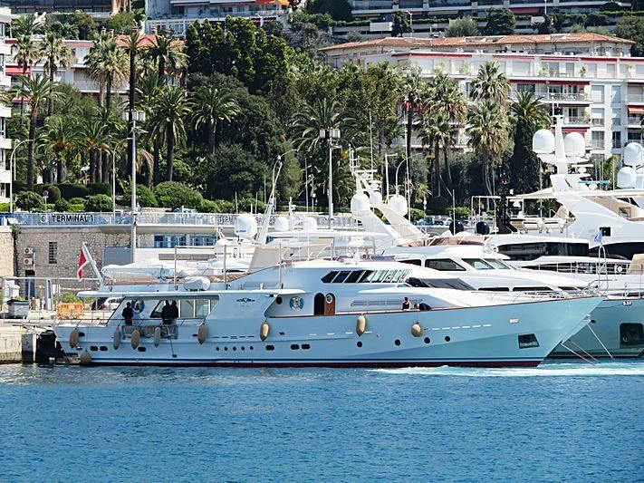 a large white boat on the water aboard VESPUCCI Yacht for Sale