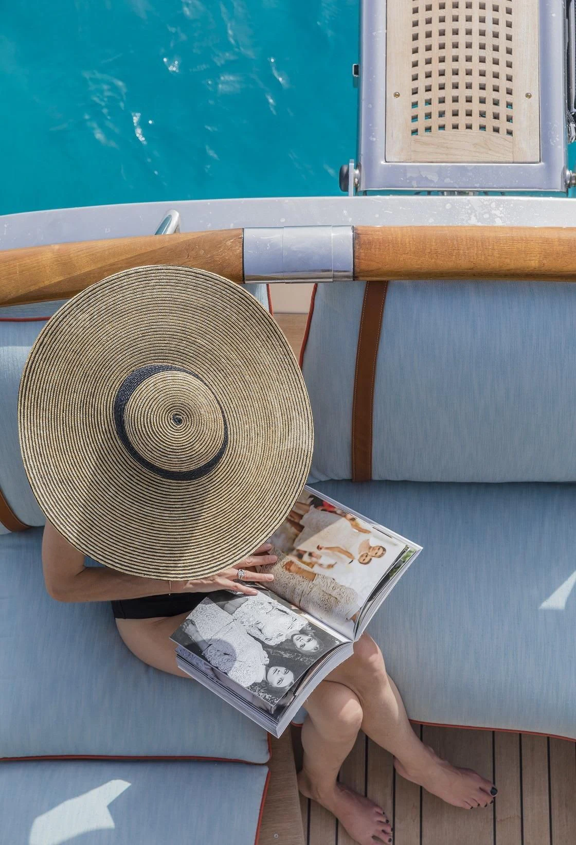 a person holding money and a record aboard VESPUCCI Yacht for Sale