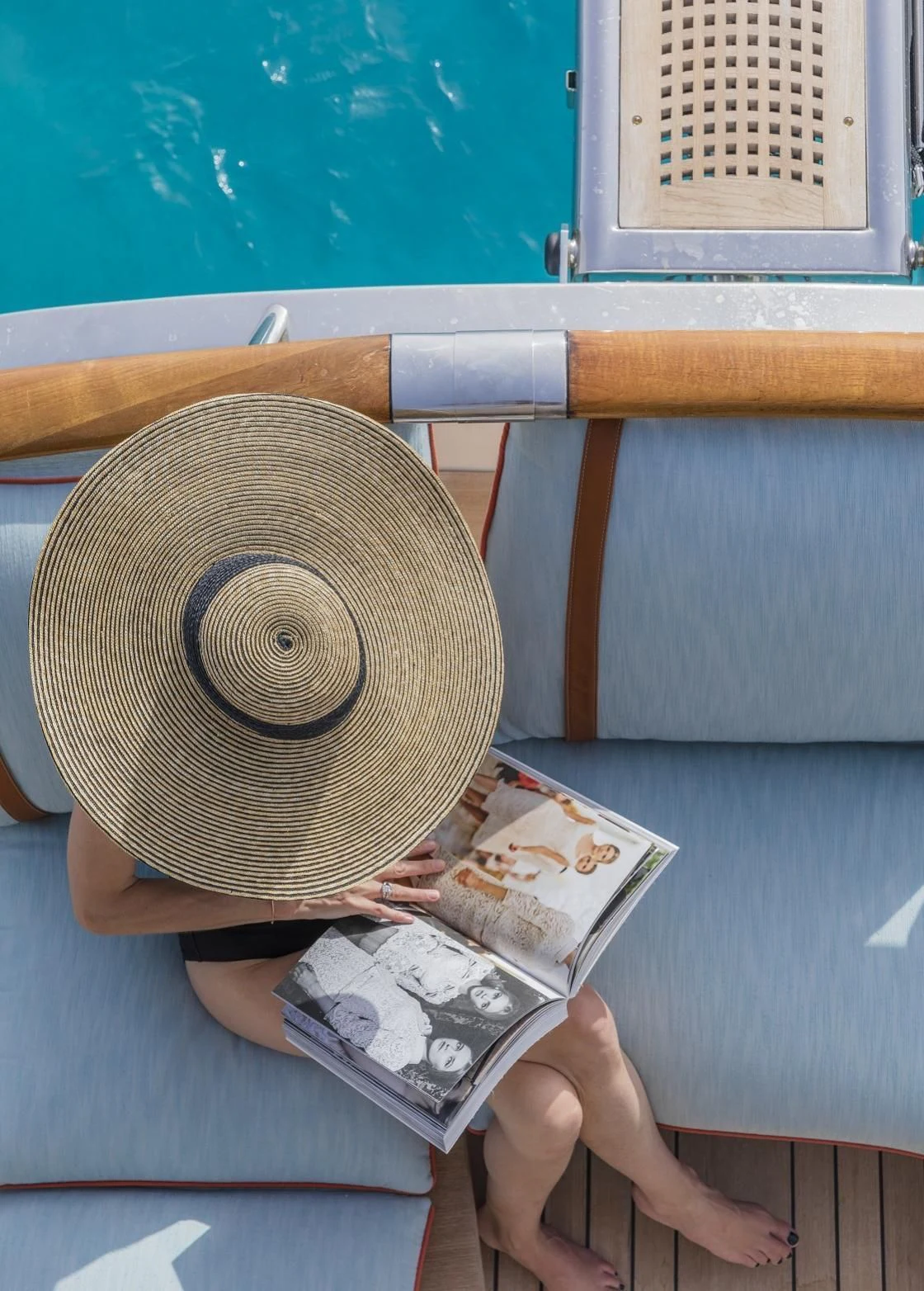 a person holding money and a record aboard VESPUCCI Yacht for Sale