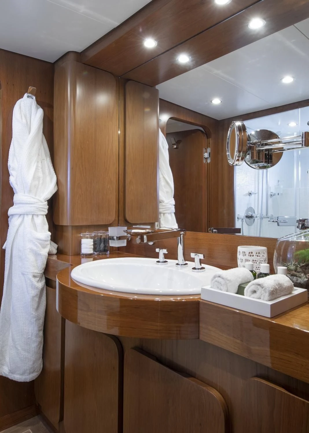 a bathroom with a large mirror aboard VESPUCCI Yacht for Sale