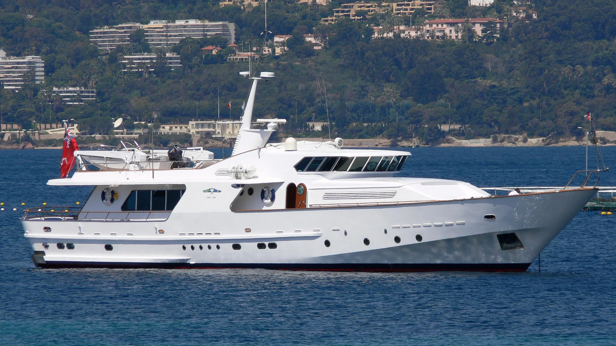 a white yacht in the water aboard VESPUCCI Yacht for Sale