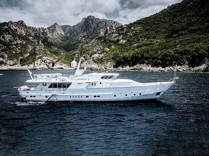 a white yacht in the water aboard VESPUCCI Yacht for Sale