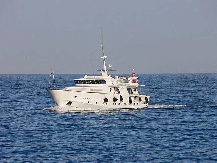 a white boat in the water aboard VESPUCCI Yacht for Sale