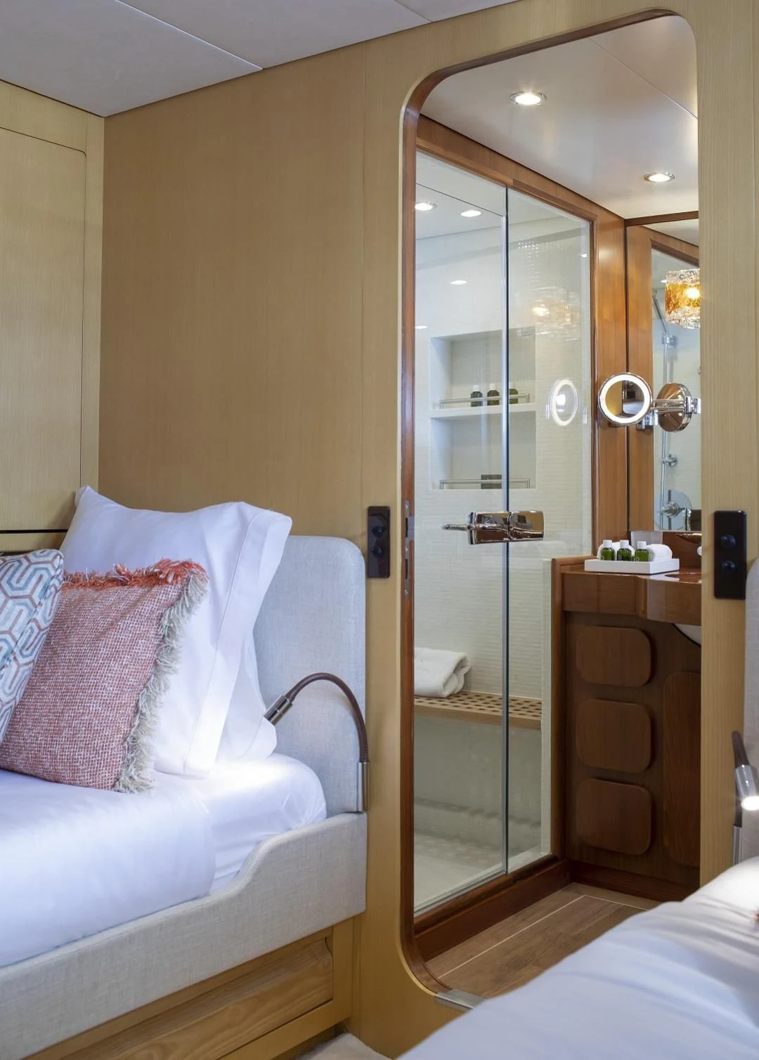 a bathroom with a glass shower aboard VESPUCCI Yacht for Sale