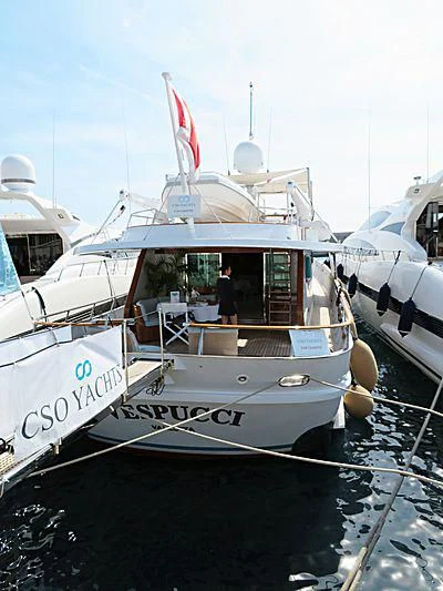 a boat with a flag on the front aboard VESPUCCI Yacht for Sale
