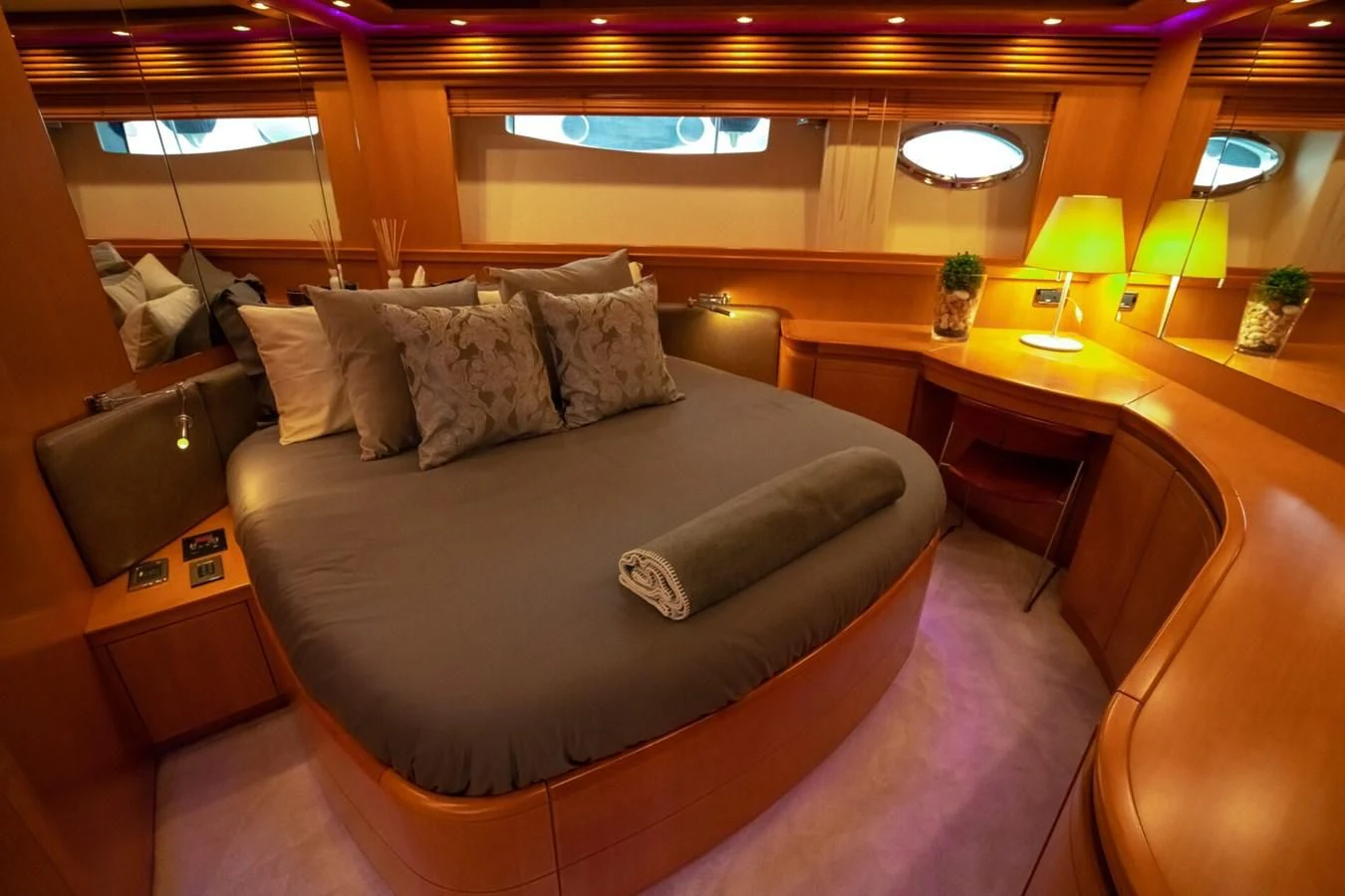 a bed in a room aboard PERSHING 90 Yacht for Sale