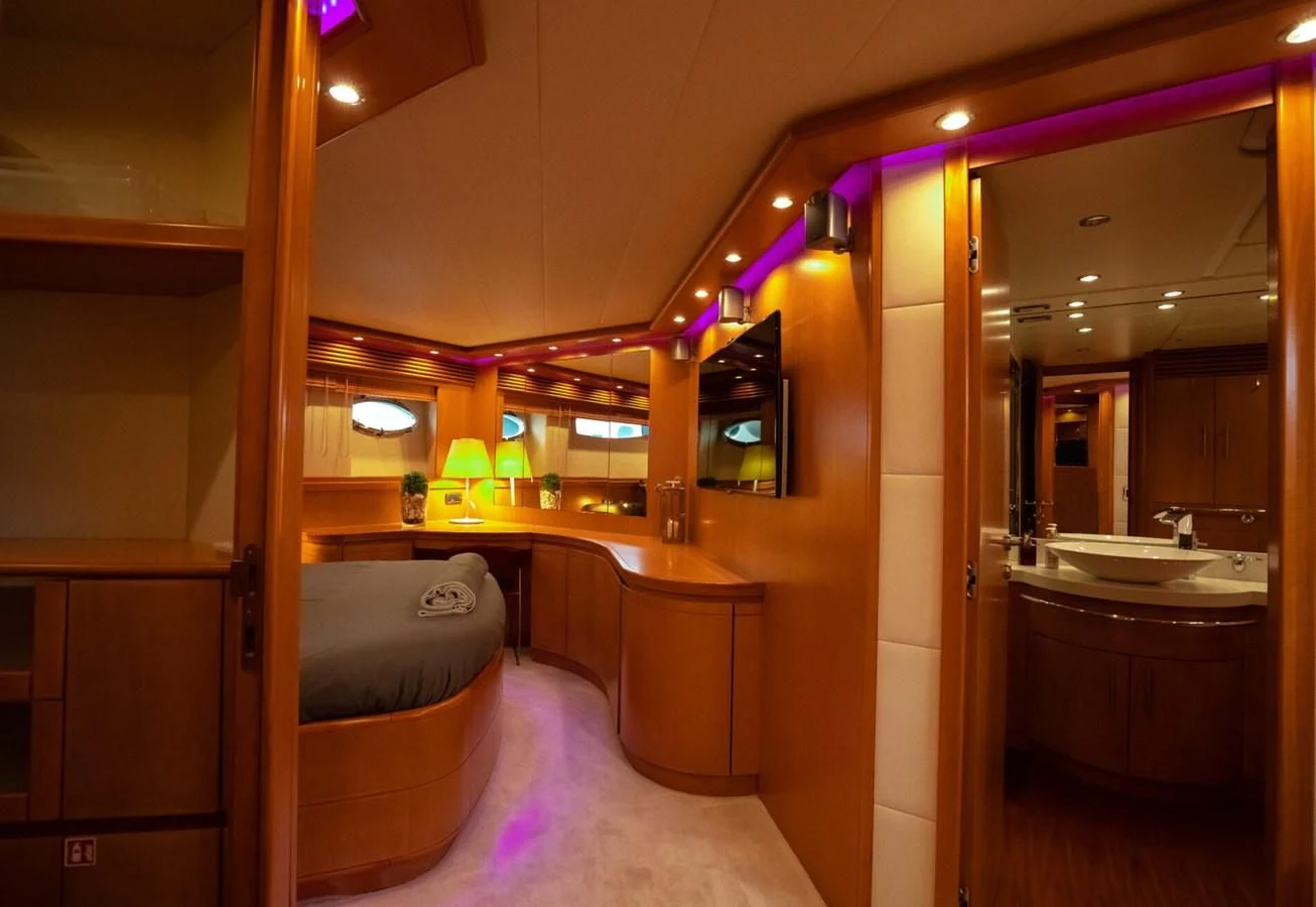 a bathroom with a sink and a bathtub aboard PERSHING 90 Yacht for Sale