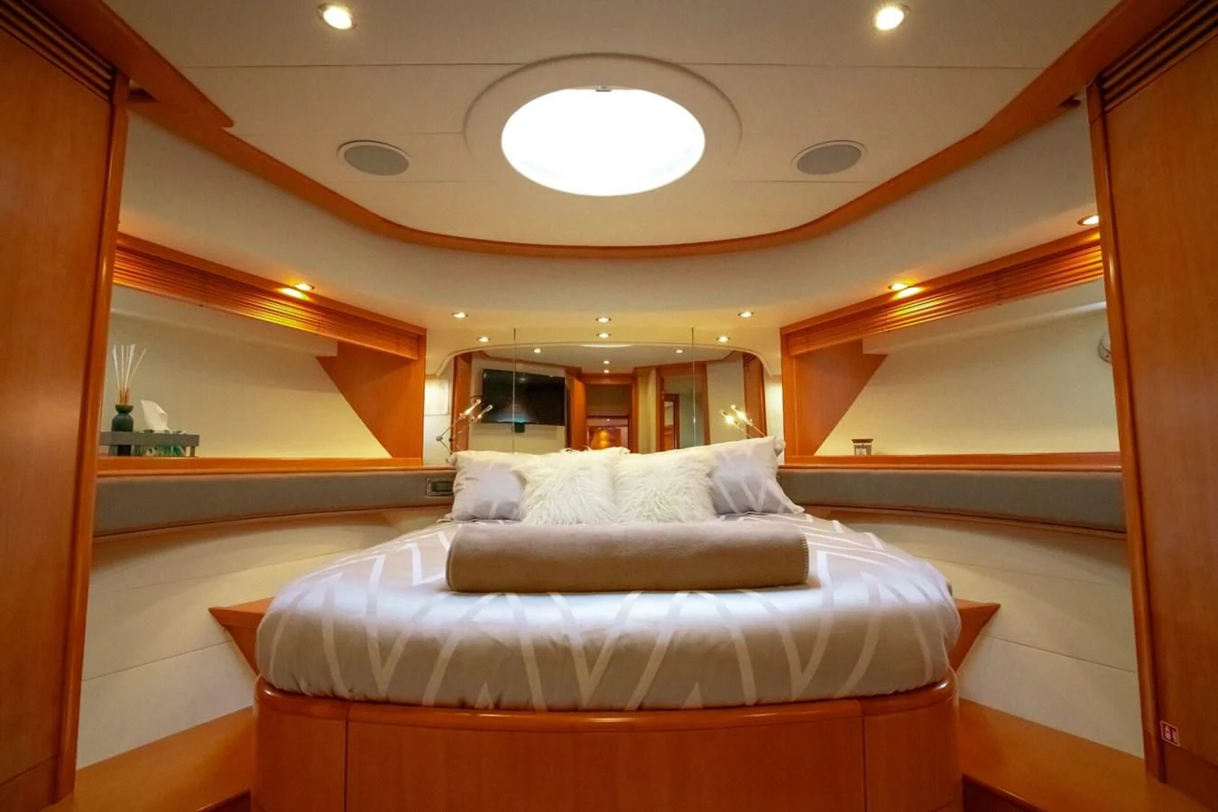a bed in a room aboard PERSHING 90 Yacht for Sale