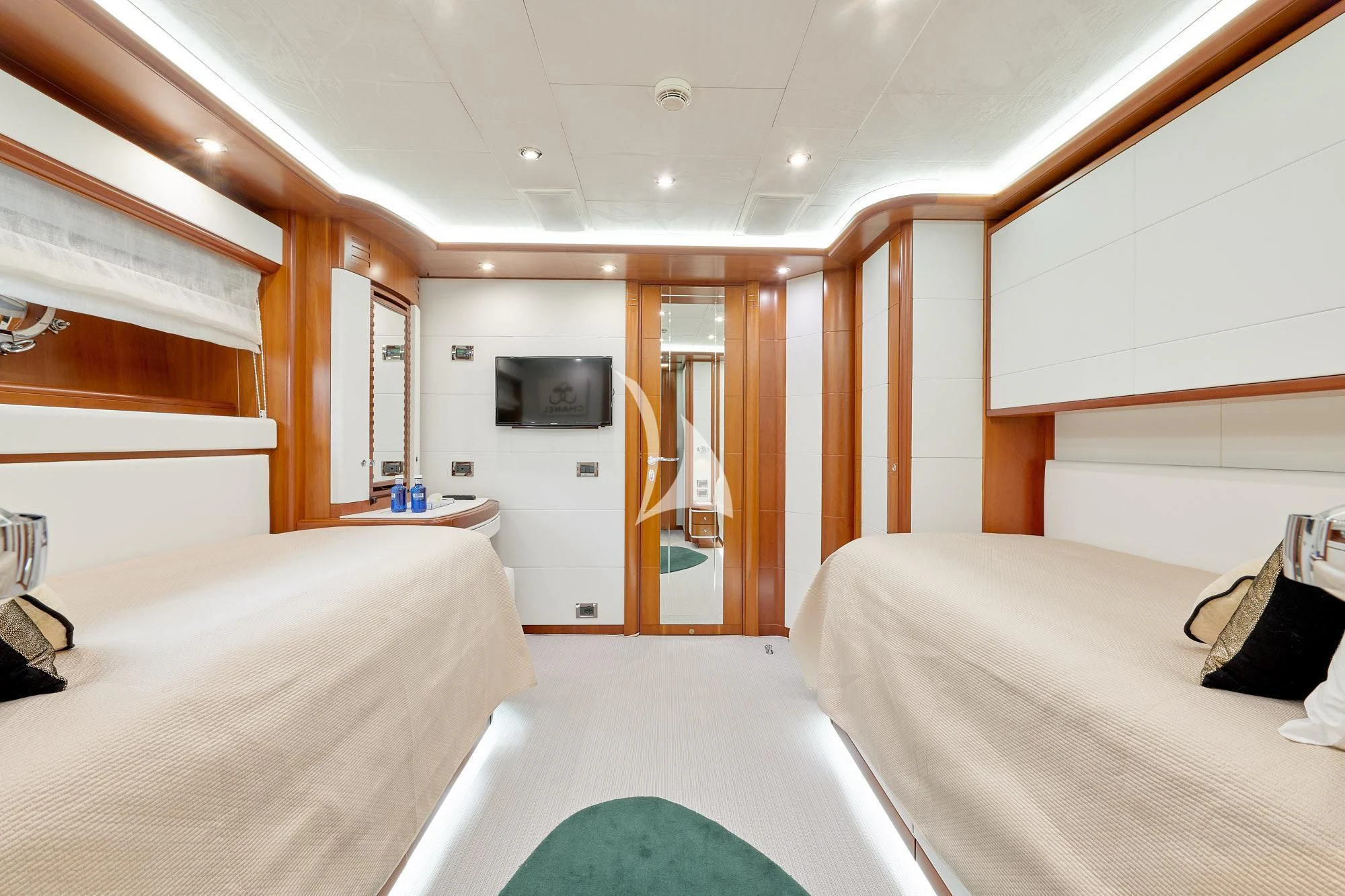 a room with a bed and a television aboard BUNKER Yacht for Sale