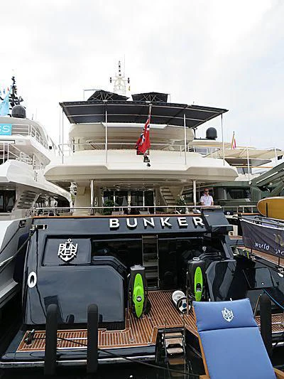 a boat with a large deck aboard BUNKER Yacht for Sale