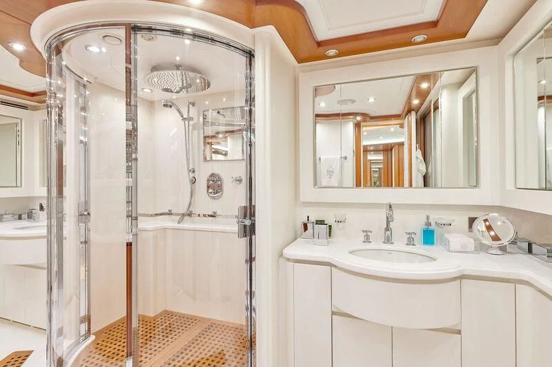 a bathroom with a shower and sink aboard BUNKER Yacht for Sale