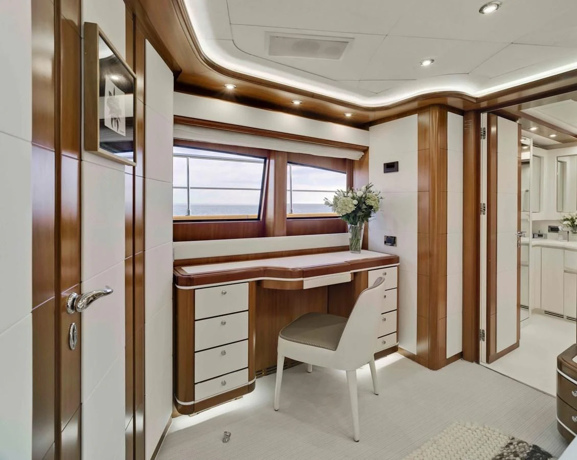 a white office with a desk aboard BUNKER Yacht for Sale