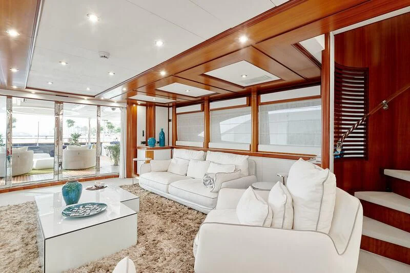 a living room with a large window aboard BUNKER Yacht for Sale
