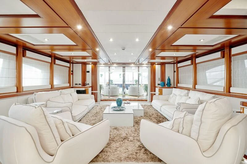 a living room with a large window aboard BUNKER Yacht for Sale