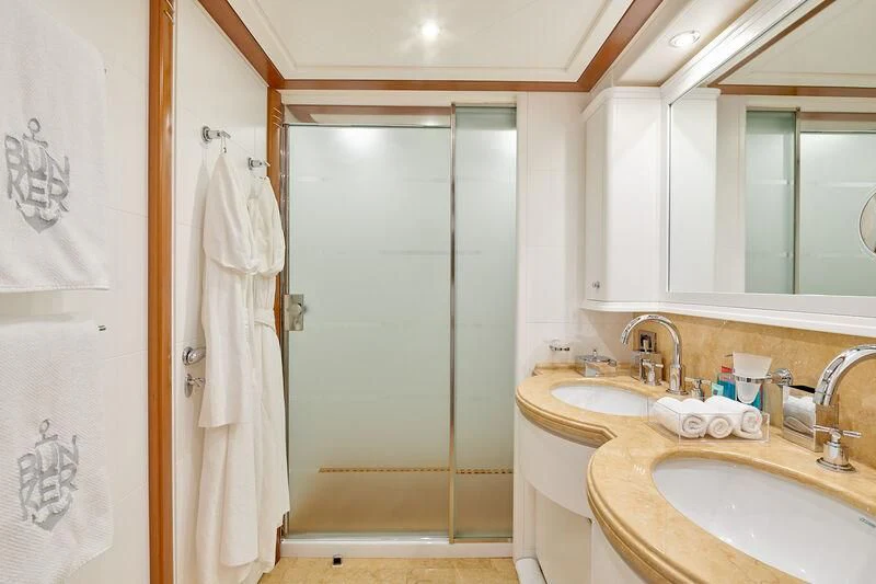 a bathroom with a sink and a shower aboard BUNKER Yacht for Sale