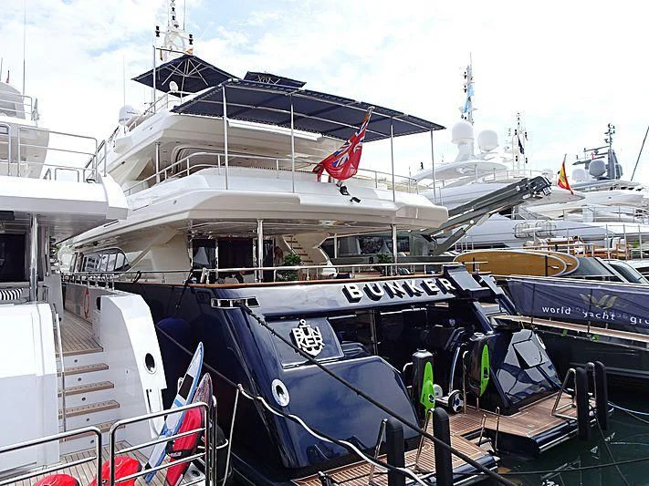 a boat docked at a pier aboard BUNKER Yacht for Sale