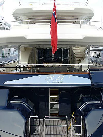 a bus with a flag on the roof aboard BUNKER Yacht for Sale