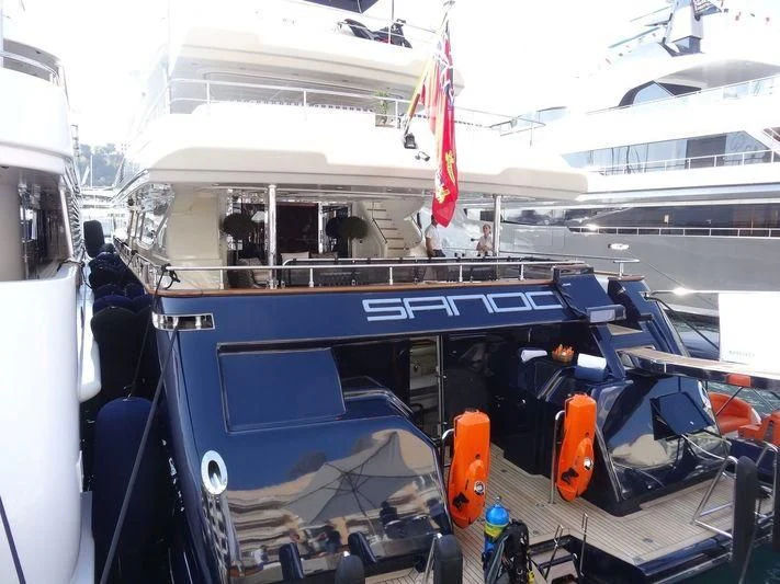 a boat with a boat in the water aboard BUNKER Yacht for Sale