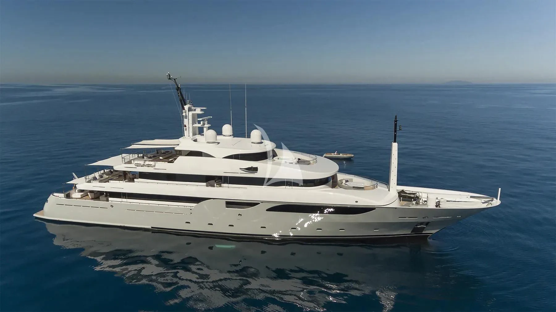 a white yacht in the water aboard TALEYA Yacht for Sale