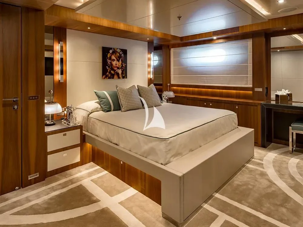 a bed in a room aboard TALEYA Yacht for Sale