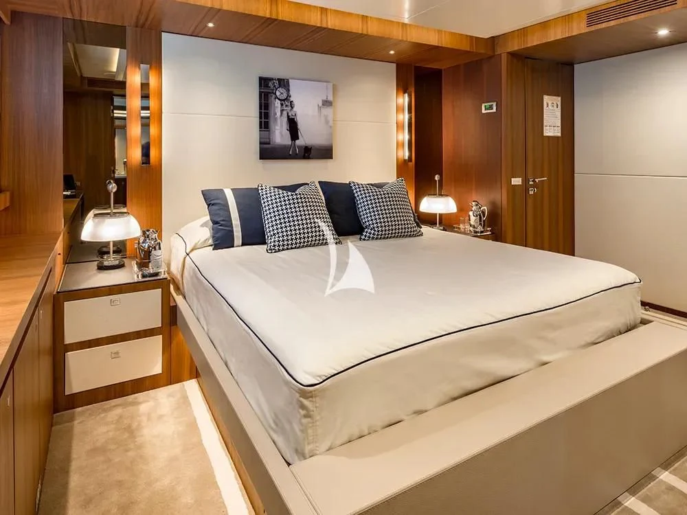 a bed with pillows and pillows aboard TALEYA Yacht for Sale