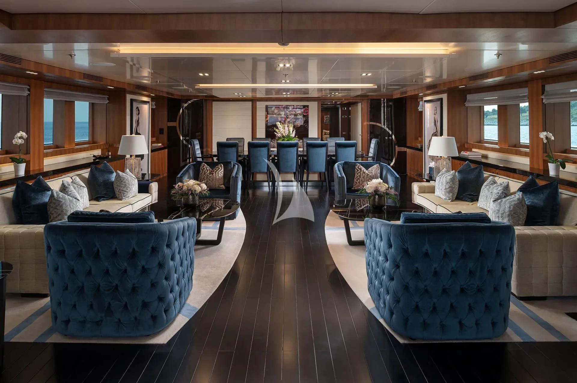 a living room with a wood floor aboard TALEYA Yacht for Sale