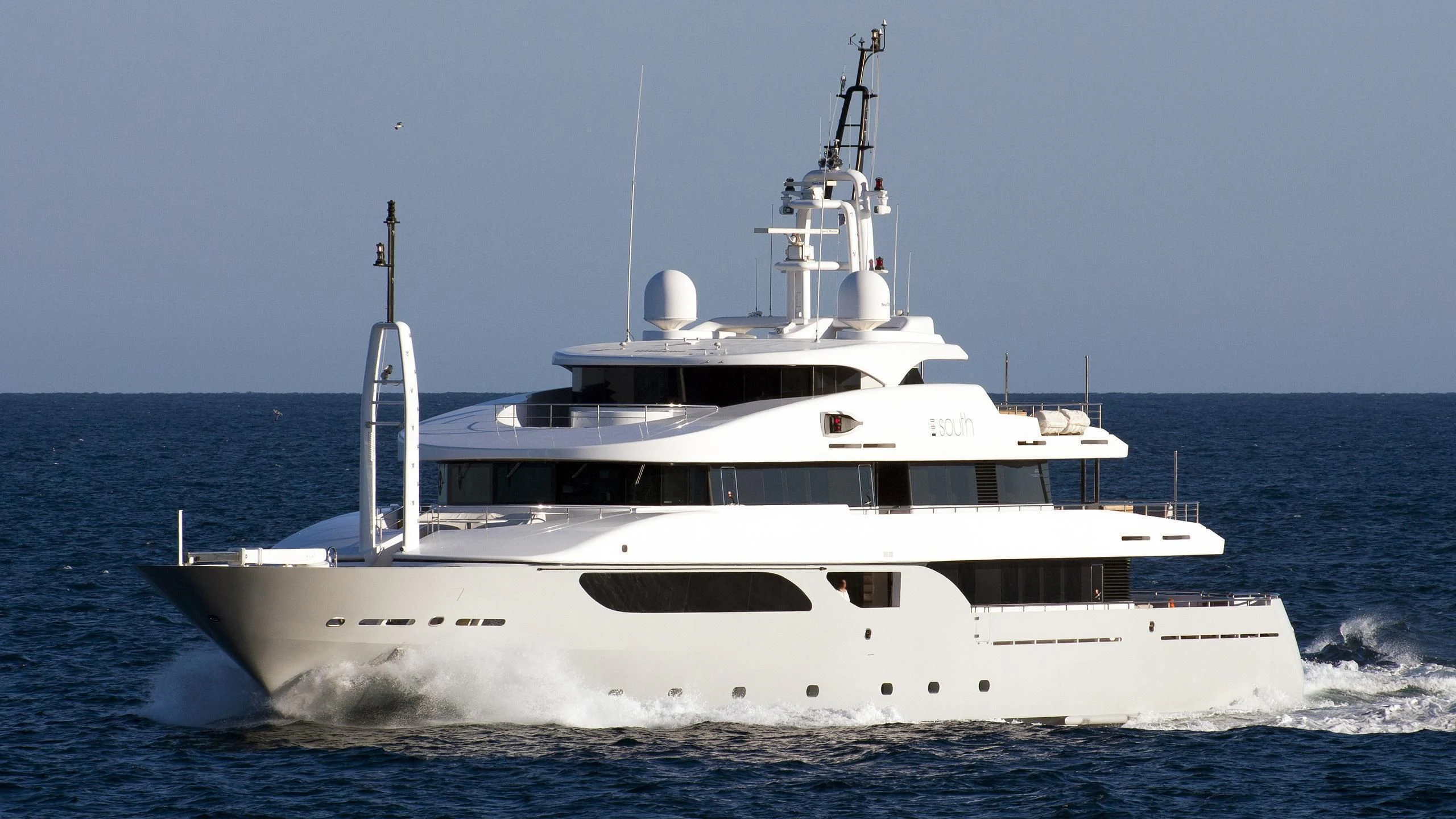a white yacht in the water aboard TALEYA Yacht for Sale