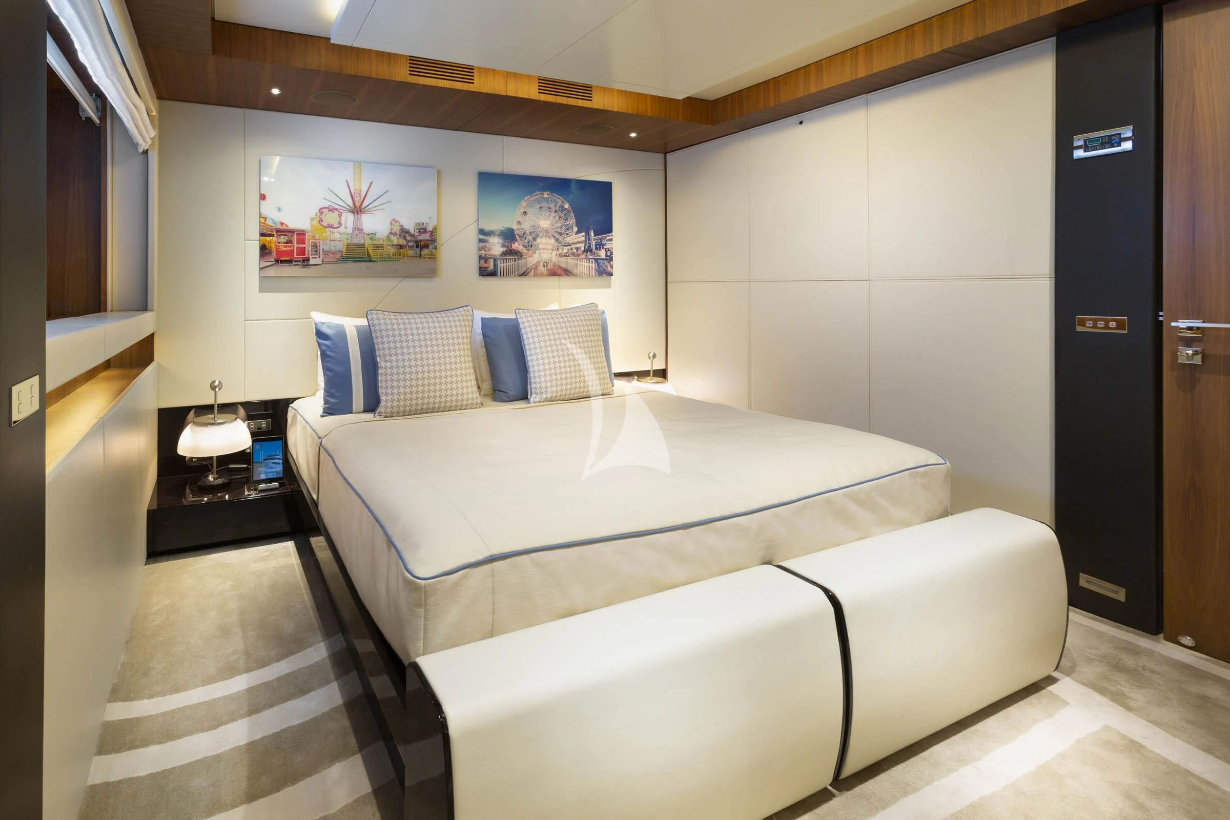 a bed in a room aboard TALEYA Yacht for Sale