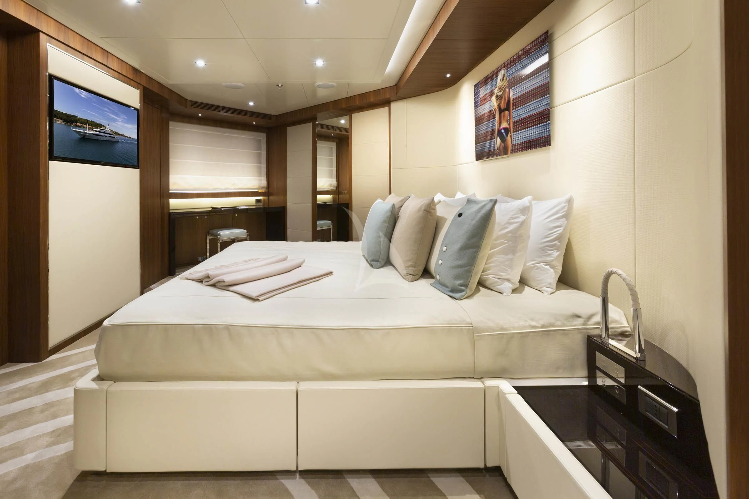 a bed in a room aboard TALEYA Yacht for Sale