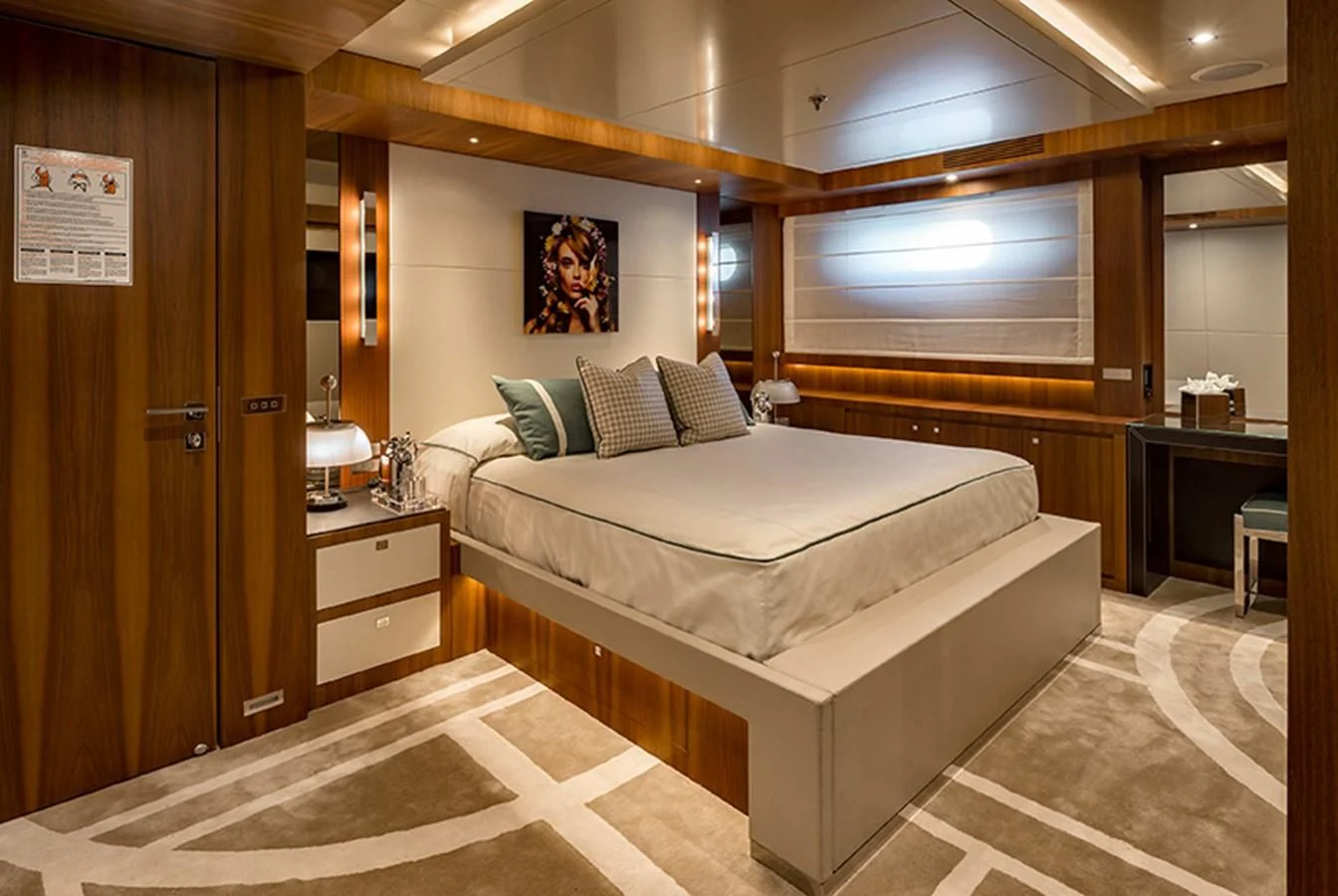 a hotel room with a bed aboard TALEYA Yacht for Sale