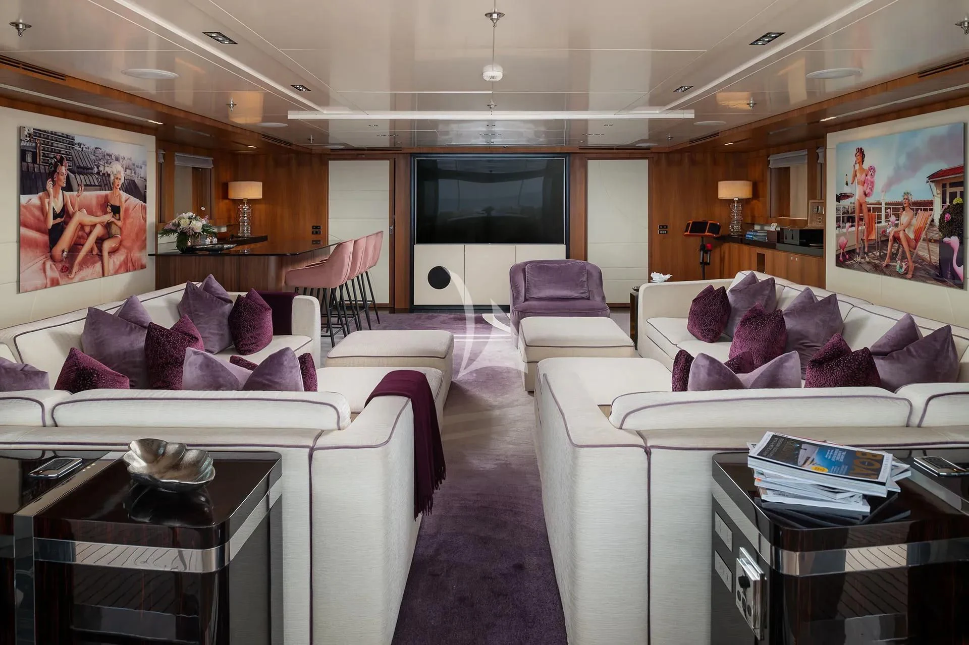 a living room with a large mirror aboard TALEYA Yacht for Sale