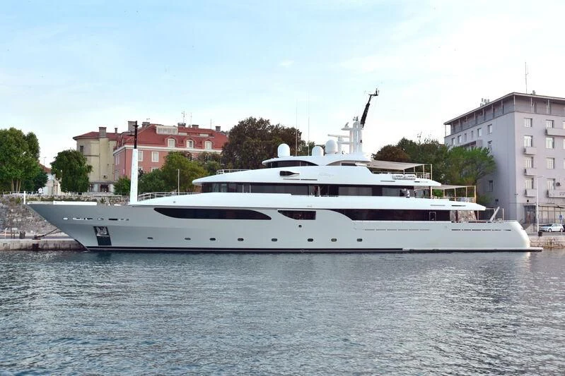 a white yacht on the water aboard TALEYA Yacht for Sale