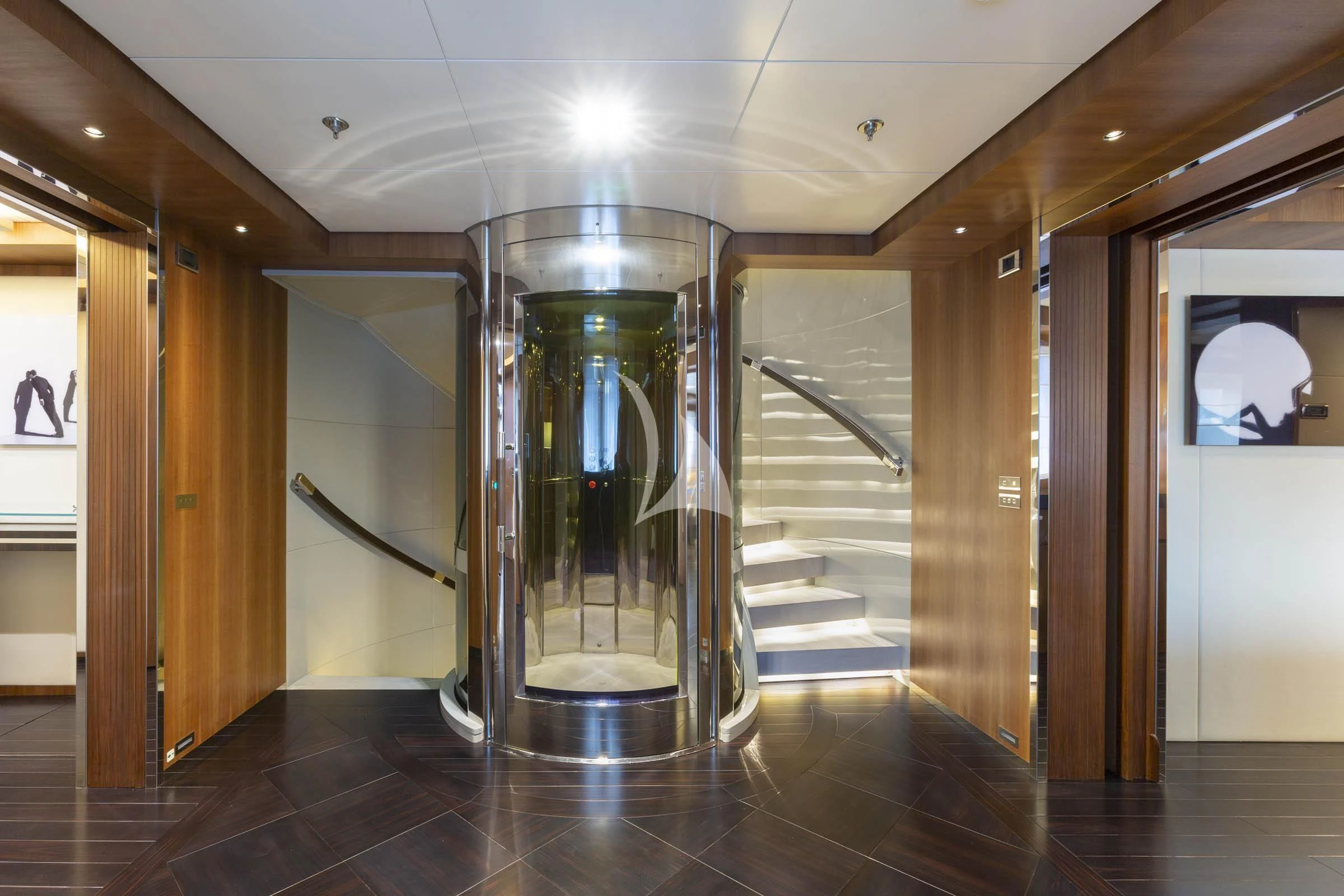 a large glass door in a room aboard TALEYA Yacht for Sale