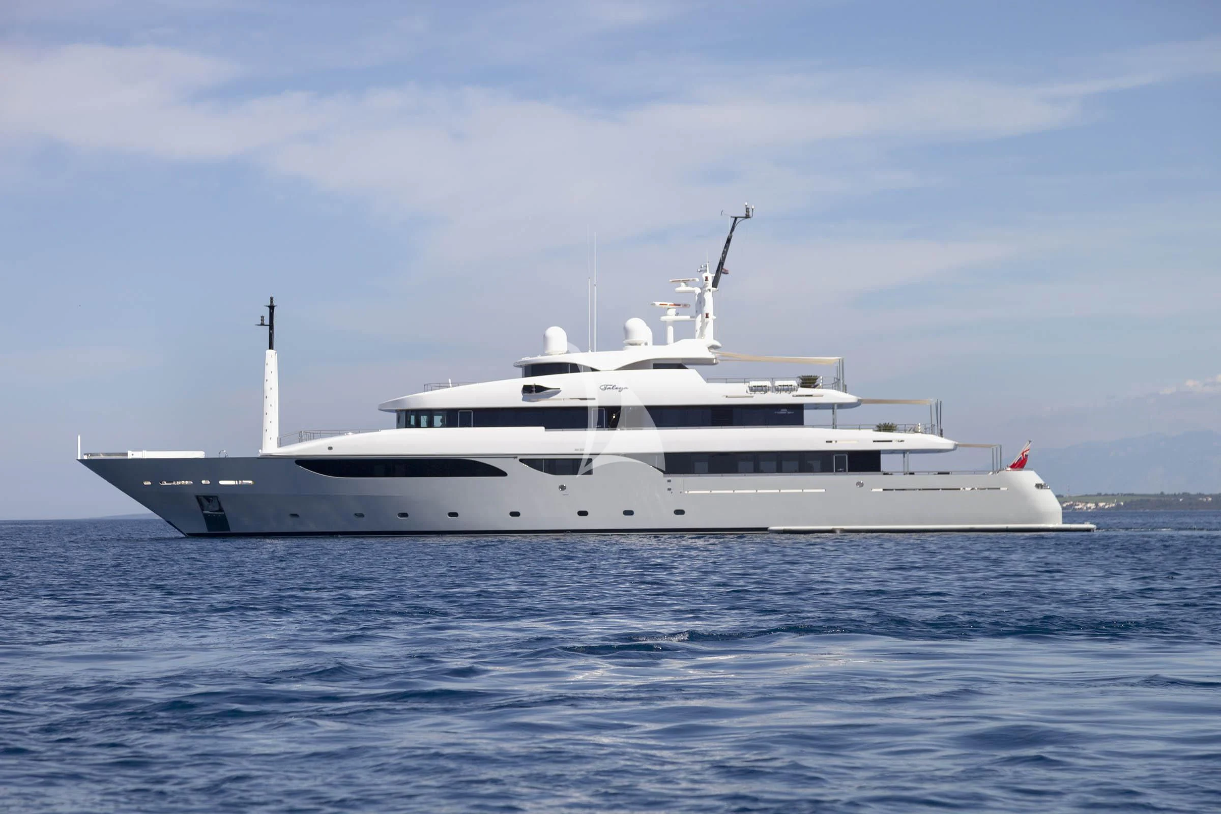a white yacht in the water aboard TALEYA Yacht for Sale