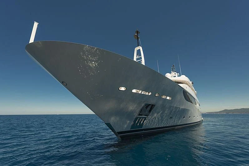 a large ship in the water aboard TALEYA Yacht for Sale