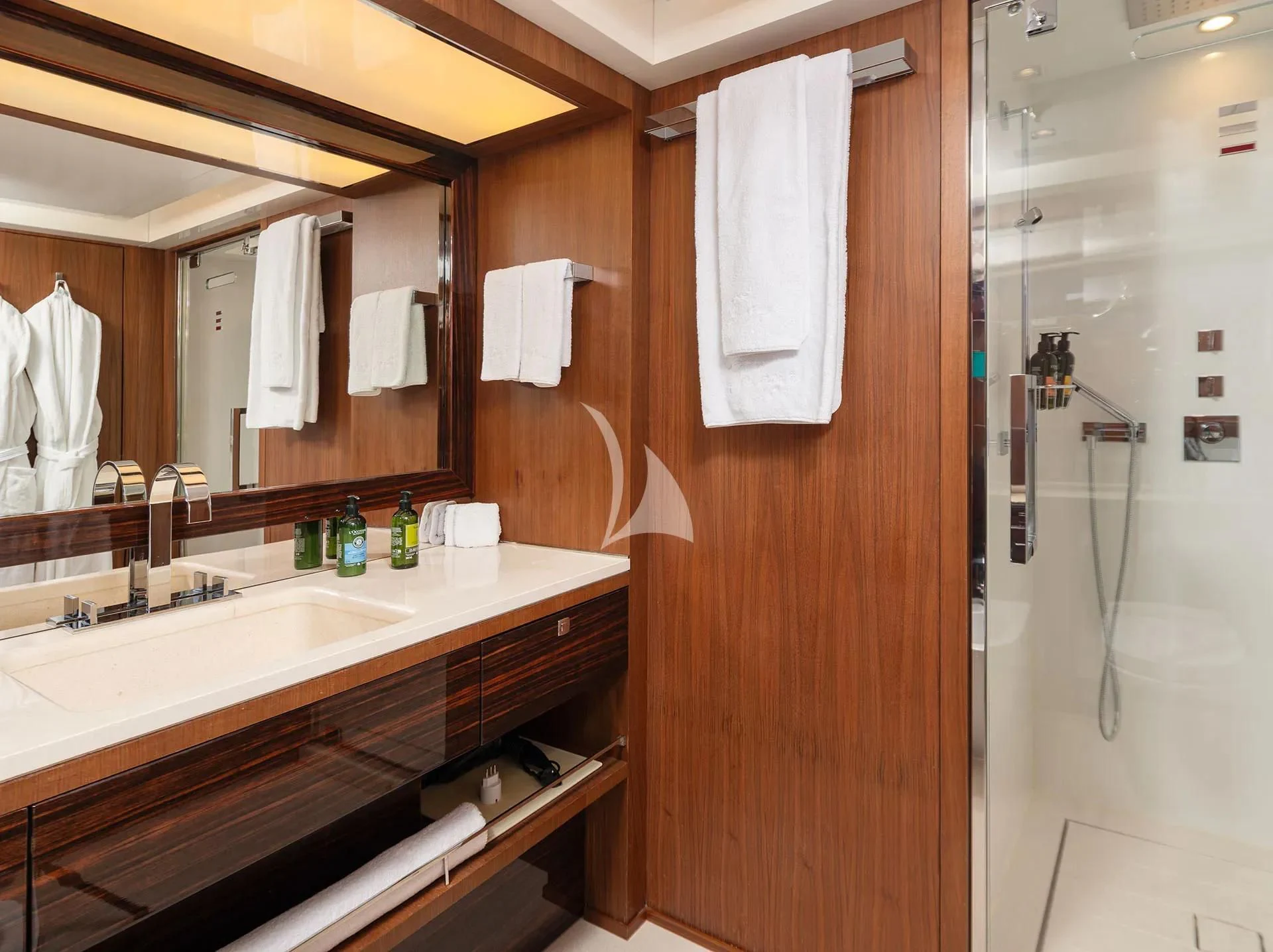 a bathroom with a shower and sink aboard TALEYA Yacht for Sale