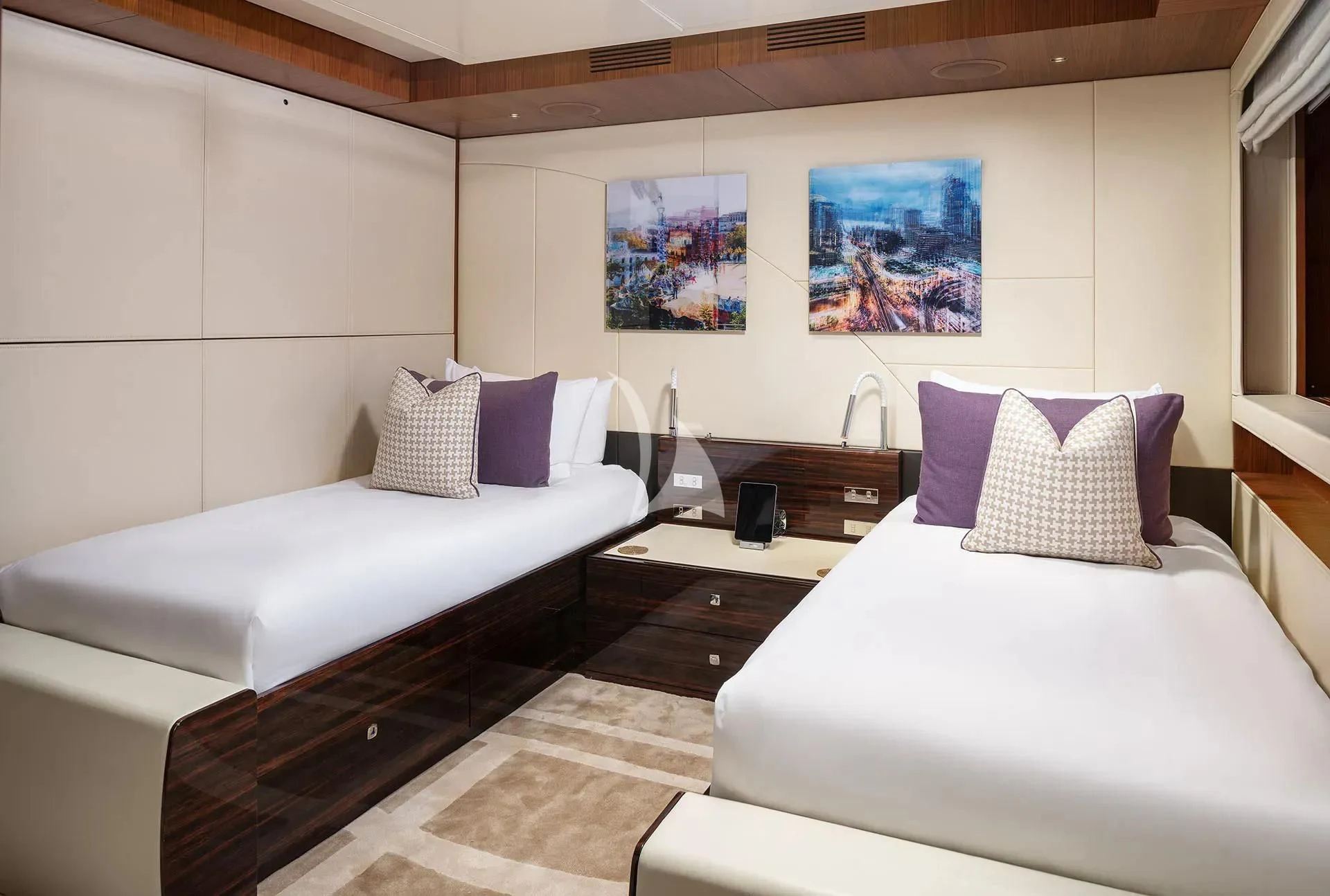 a room with two beds aboard TALEYA Yacht for Sale